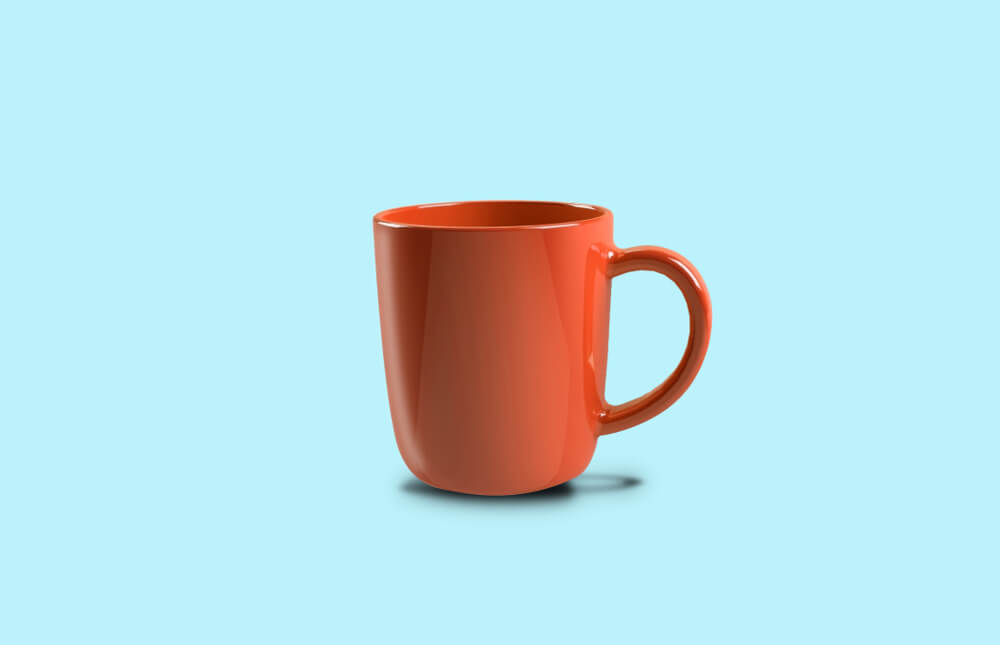 Red Glossy Cup against light blue background, Coffee, Tea, Caffeine Drink.