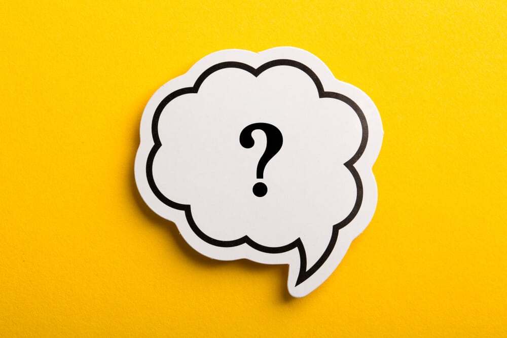 Question mark speech bubble isolated on yellow background; concept for questioning if the DockATot is safe.
